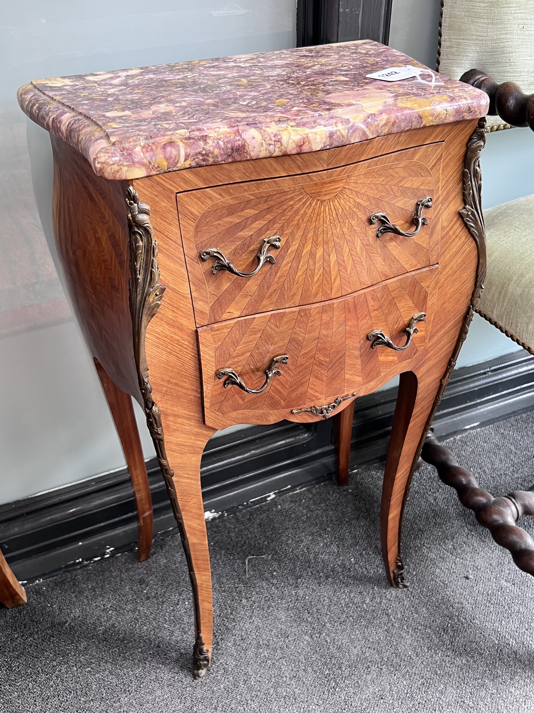 A pair of French Louis XV style parquetry bombe fronted rouge marble topped bedside cabinets, width 44cm, height 74cm